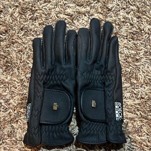 Black Roeckl riding Gloves never worn.